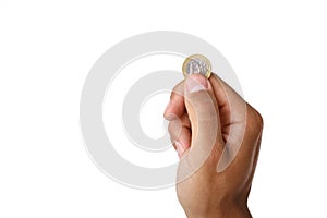 Man`s hand holding euro coin