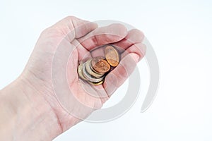 Man`s hand holding euro coins isolated. Finance concept