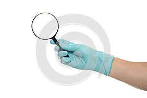 Man`s hand holding magnifying glass, close up isolated on white background, copy space for your text. Magnifier for reading