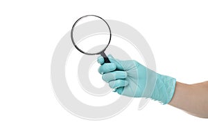 Man`s hand holding magnifying glass, close up isolated on white background, copy space for your text. Magnifier for reading