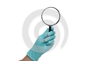 Man`s hand holding magnifying glass, close up isolated on white background, copy space for your text. Magnifier for reading