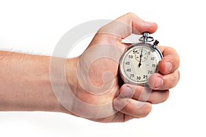 Man's hand holding stopwatch