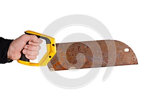 a man& x27;s hand holds an old rusty saw isolated on a white background