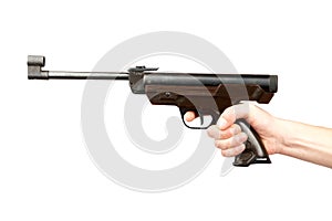 The man's hand holds pneumatic pistol