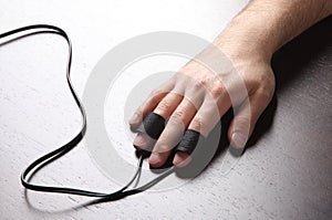 Man's Hand with Polygraph Electrodes photo