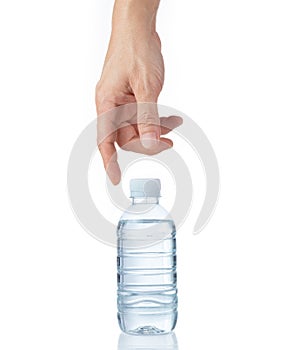 Man's hand reaching for a bottle of water