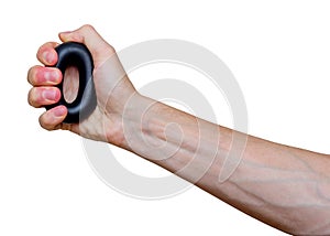 Man`s hand with rubber ring used as hand expander hand gripper. Hand grip strengthening tool.