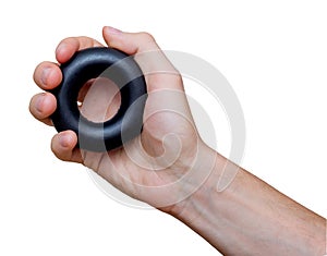 Man`s hand with rubber ring used as hand expander hand gripper. Hand grip strengthening tool.