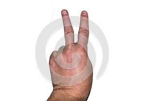 Man's hand with two fingers raised. The sign of victory. Sign language