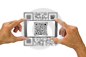 Man`s hands holding smartphone scanning QR code on white background