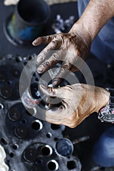 man& x27;s hands, oiling and greasing valves