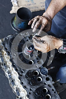 man& x27;s hands, oiling and greasing valves