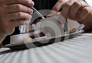 Man`s hands with Presso coffee on a table. Slovakia