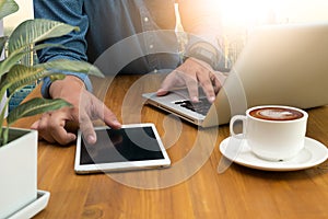 Man's hands using a laptop at home, business man hands busy usin