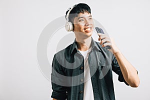 A man's happy karaoke moment unfolds as he listens to music on his