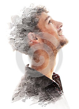 A man's profile looking up in double exposure paintography
