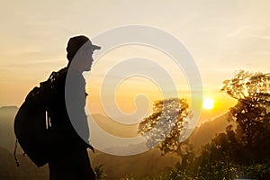 Man's silhouette at a viewpoint overlooking central Thailand