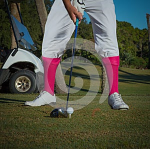 man`s Vintage golfing outfit with pink socks