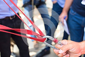 Man with safety carabines and tools