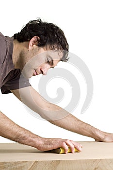 Man sanding wood