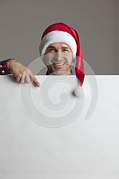 Man in Santa hat with banner