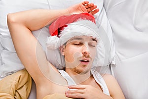 Man in Santa Hat sleeping