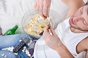 Man savouring every bite of sweets