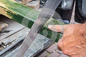 Man sawing wood