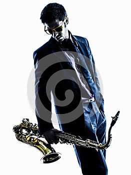 Man saxophonist playing saxophone player silhouette