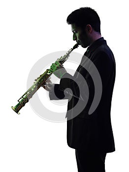 Man saxophonist playing saxophone player silhouette