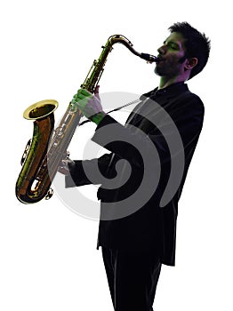 Man saxophonist playing saxophone player silhouette