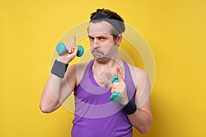 Man say eureka as gasping and give advice, lighten with amazing idea, holding dumbbells