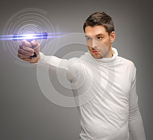 Man with sci fi weapon