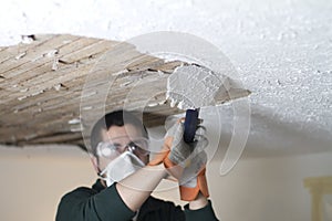Scraping Ceiling Close Up