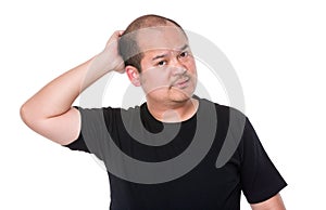 Man scratching his head