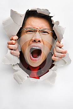 Man screaming from the hole in wall