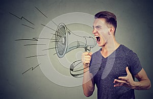 Man screaming into a megaphone making an announcement