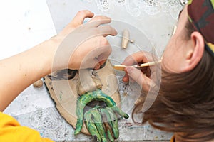 Man sculpting craft