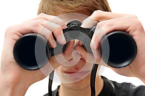 Man searching with binoculars photo