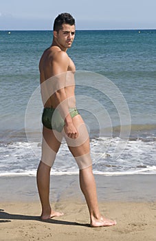 Man in the seaside with swimsuit