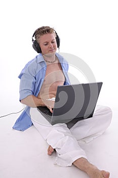 Man seated with laptop