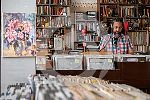 Man seen searching through vinyl records