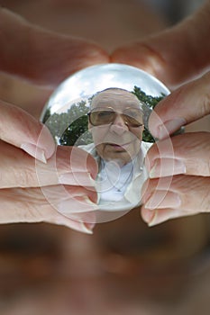 Man sees old age crystal ball