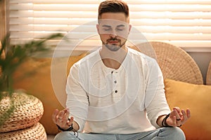 Man during self-healing session in therapy room