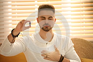 Man during self-healing session in therapy room