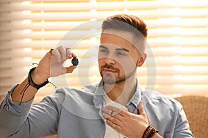 Man during self-healing session in therapy room