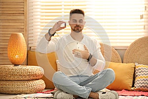 Man during self-healing session in therapy room