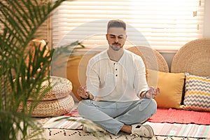 Man during self-healing session in therapy room