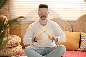 Man during self-healing session in therapy room