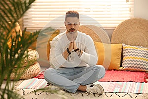 Man during self-healing session in therapy room